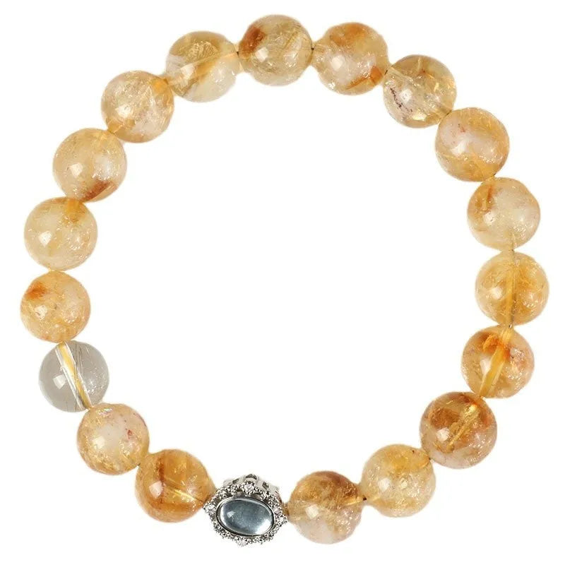 Citrine crystal bracelet with 10mm geometric shapes on wrist.
