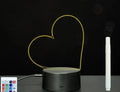 Black acrylic message board with LED lighting and remote control on wooden desk