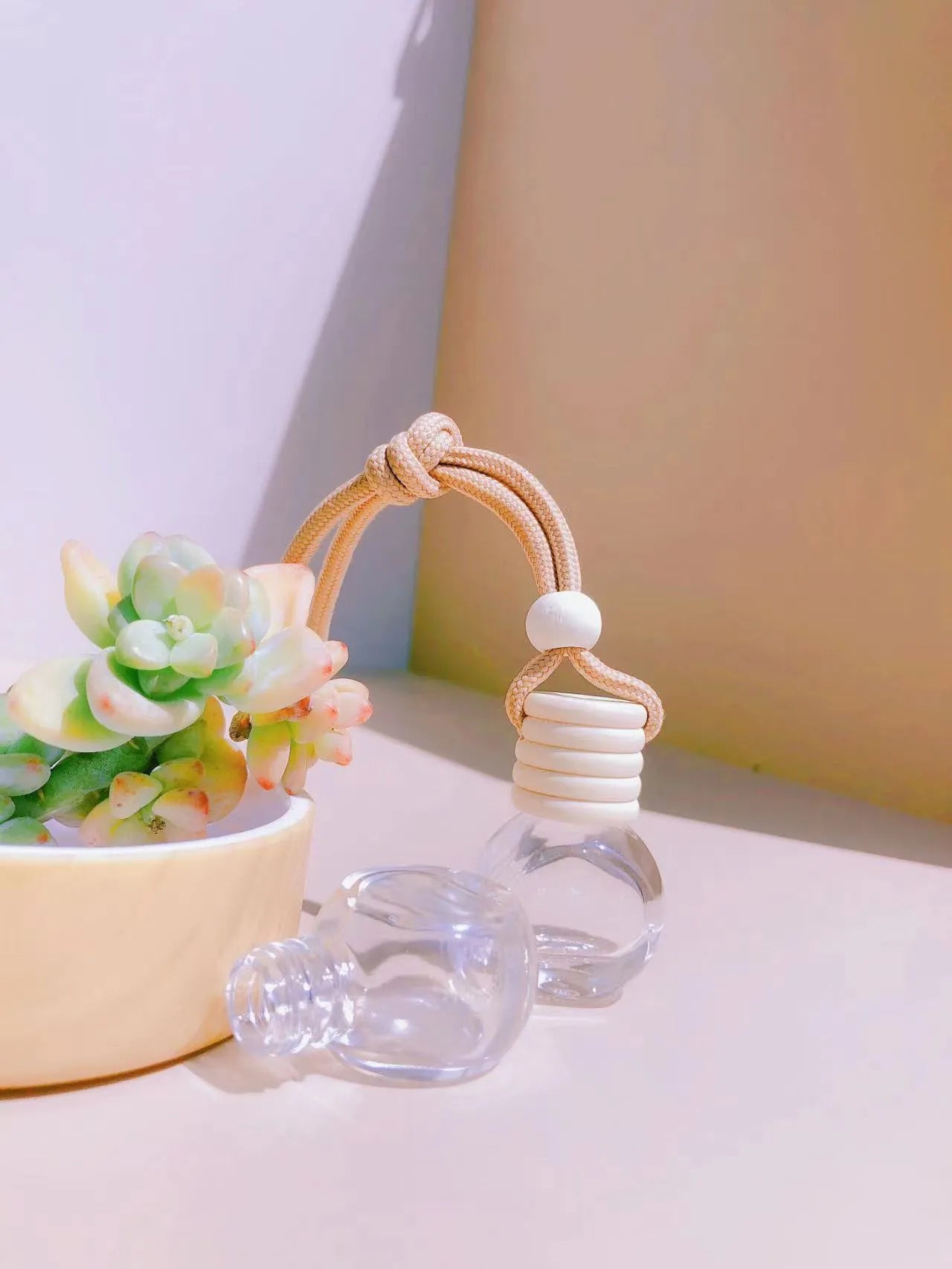 Glass car fragrance pendant showing Cylinder, Diamond, Flat Drum, and Square bottle style options.