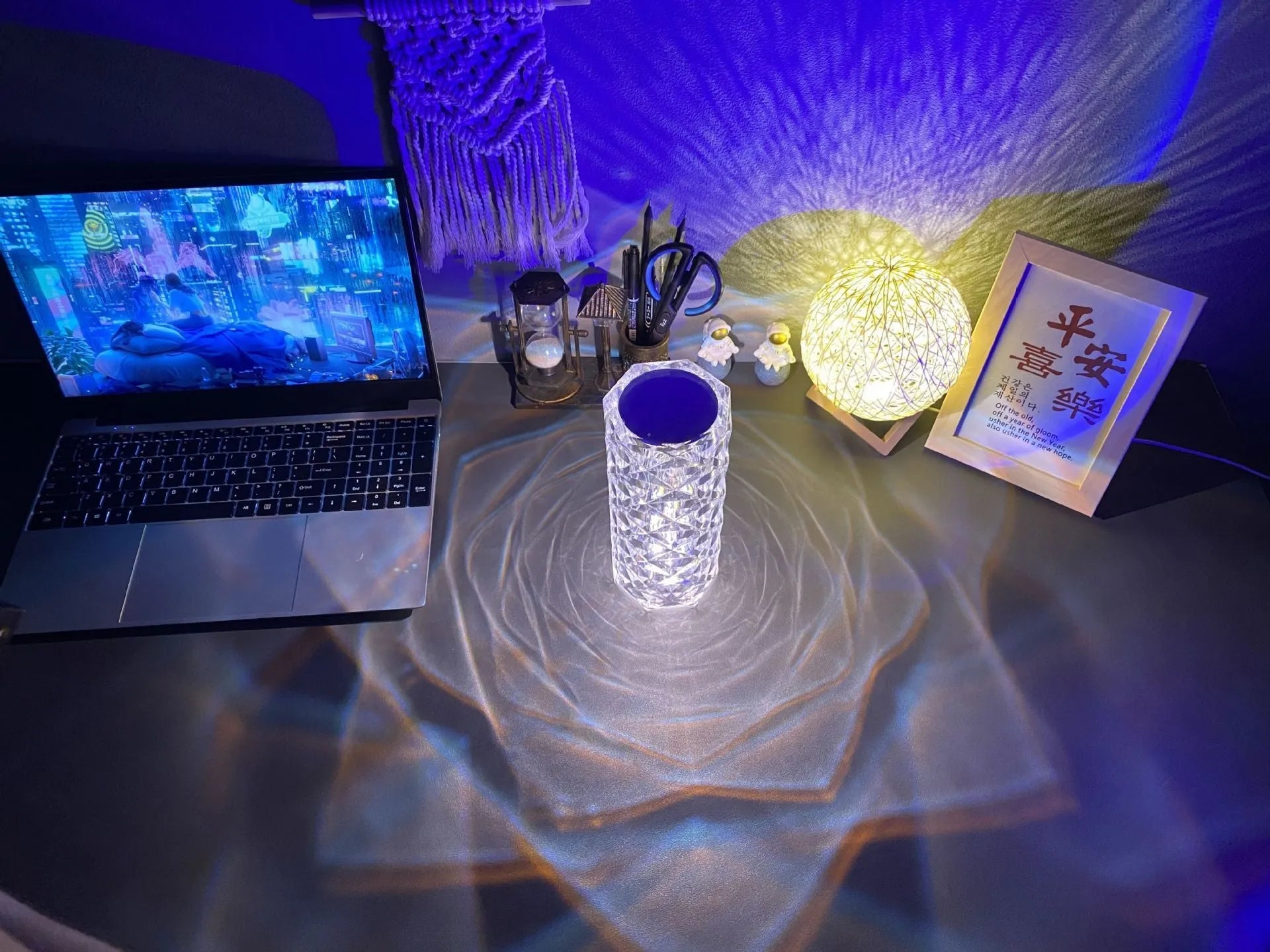 Romantic LED rose diamond table lamp with crystal-like PAMA acrylic construction on a table