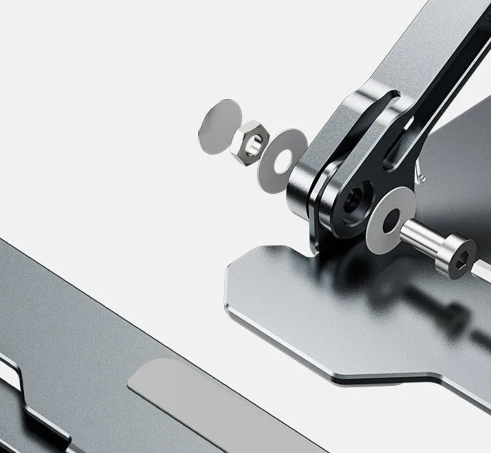 Grey aluminium adjustable and foldable laptop stand on a wooden desk.
