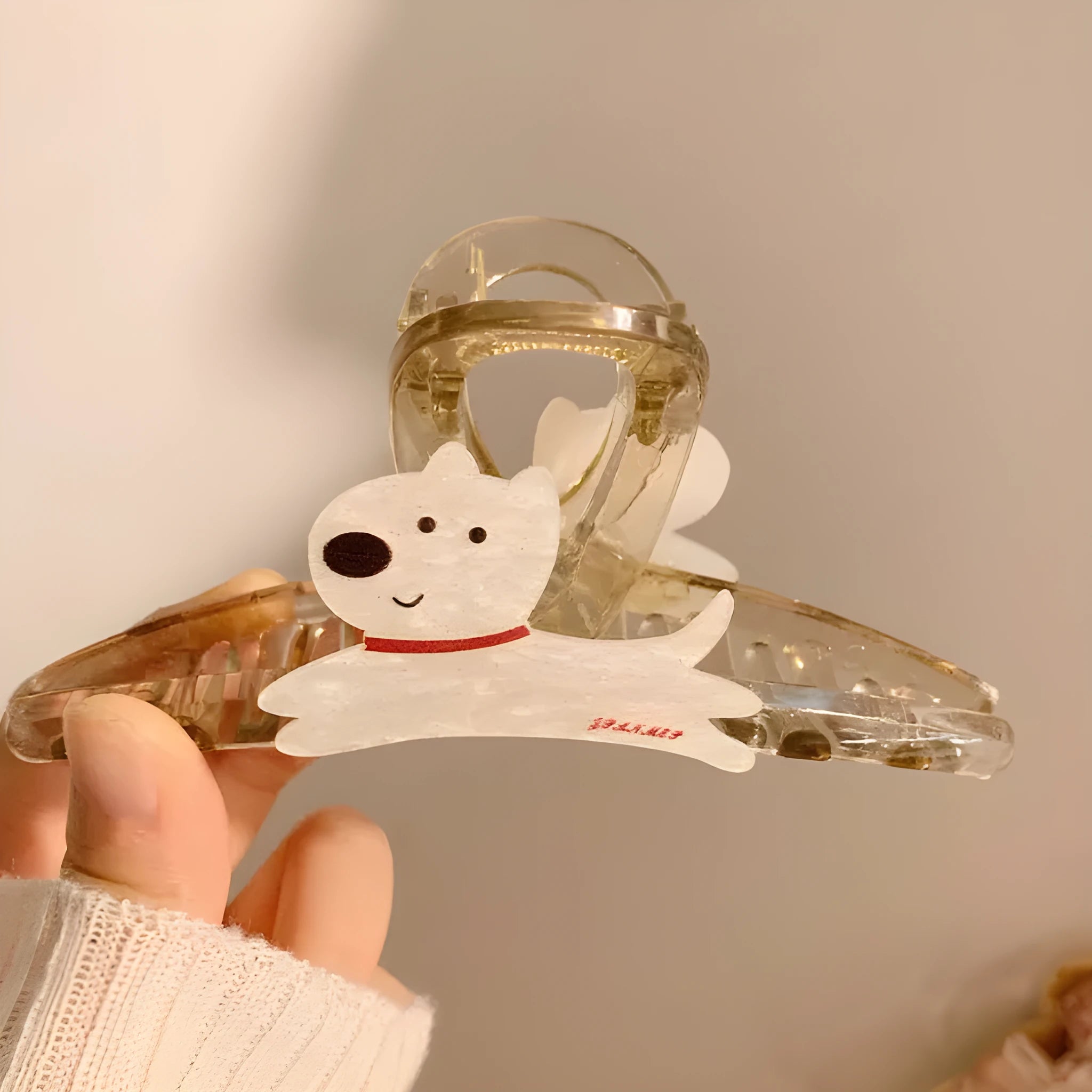 Cartoon puppy design hair barrettes in beige and brown colours with grip mechanism