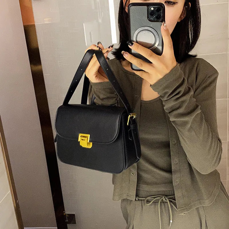 Soft black PU leather women's small square cross-body bag with a shoulder strap