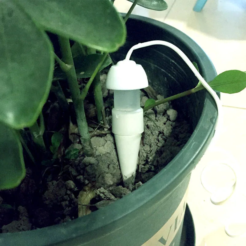 White ceramic and PP self-watering seepage device with 78cm pipe, 11cm height, 3cm diameter for potted plants