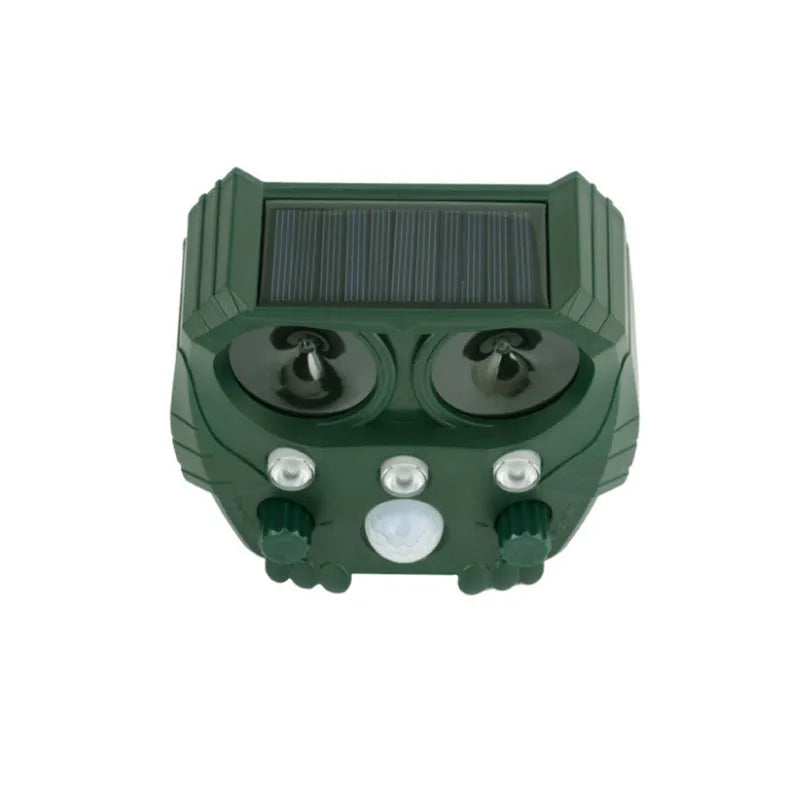 Green solar-powered ultrasonic animal repeller unit with LED light for outdoor pest control.