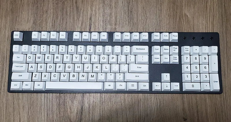 PBT sublimation keycap set showing Japanese, Russian, and Korean characters on mechanical keyboard keys