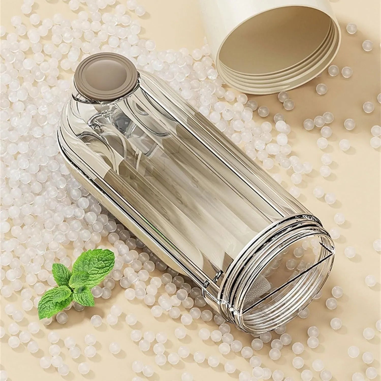 Foldable portable dog water bottle with built-in food dispenser in beige or green.