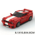 Red plastic building block model of a Ford wild horse Shelby GT500 V2 sports car on a surface