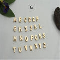 Peach heart shaped letter necklace pendant in gold and silver alloy finishes