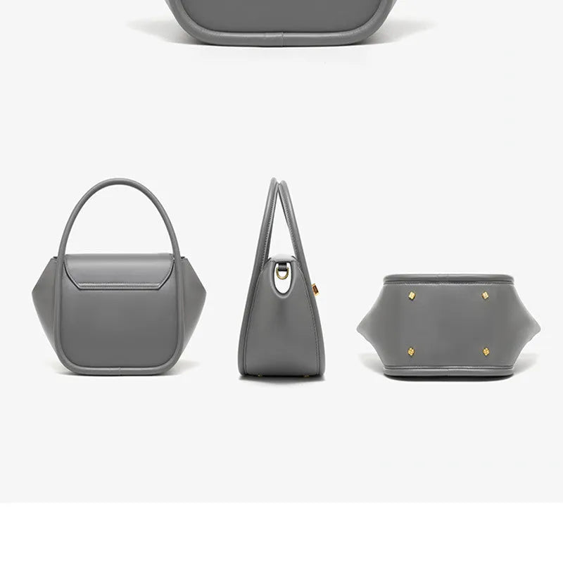 Winged shape leather tote handbag with a buckle and cross-body strap in cow leather