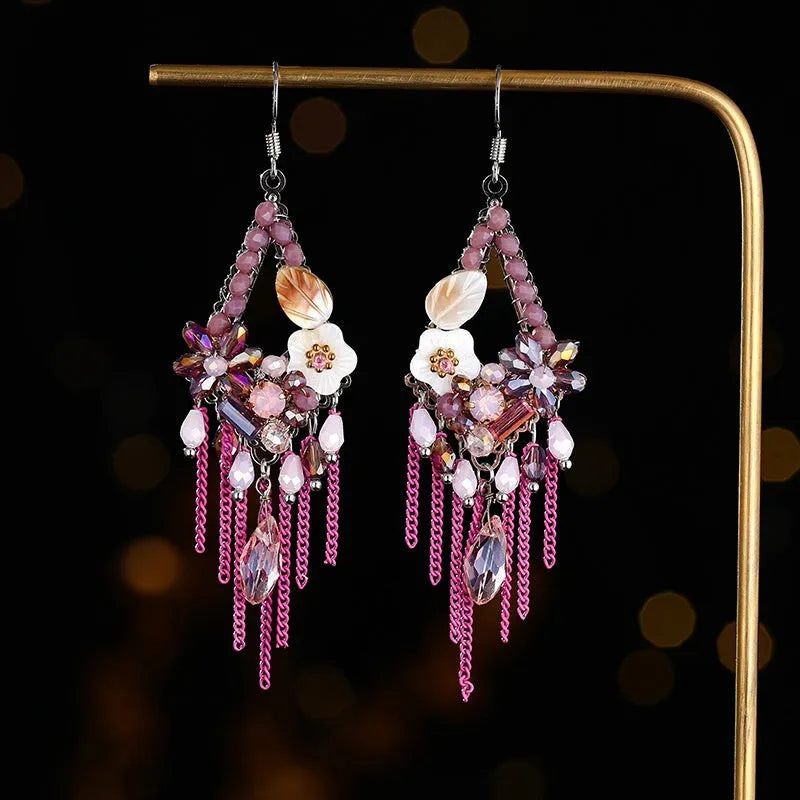 Bohemian style long earrings with hand-woven crystal details and alloy framework