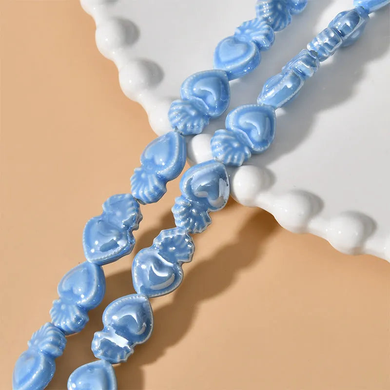 Ceramic love heart small torch beads in multiple colours for jewellery making with straight holes