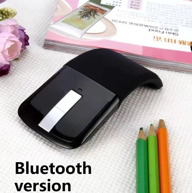 Folding Bluetooth 4.0 touch wireless mouse shown in unfolded position with dimensions 131.2 x 55 x 14.5 mm