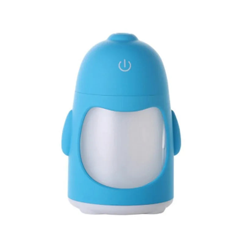 Penguin humidifier with soft blue nightlight glow, 150ml cool mist diffuser, USB powered, available in pink