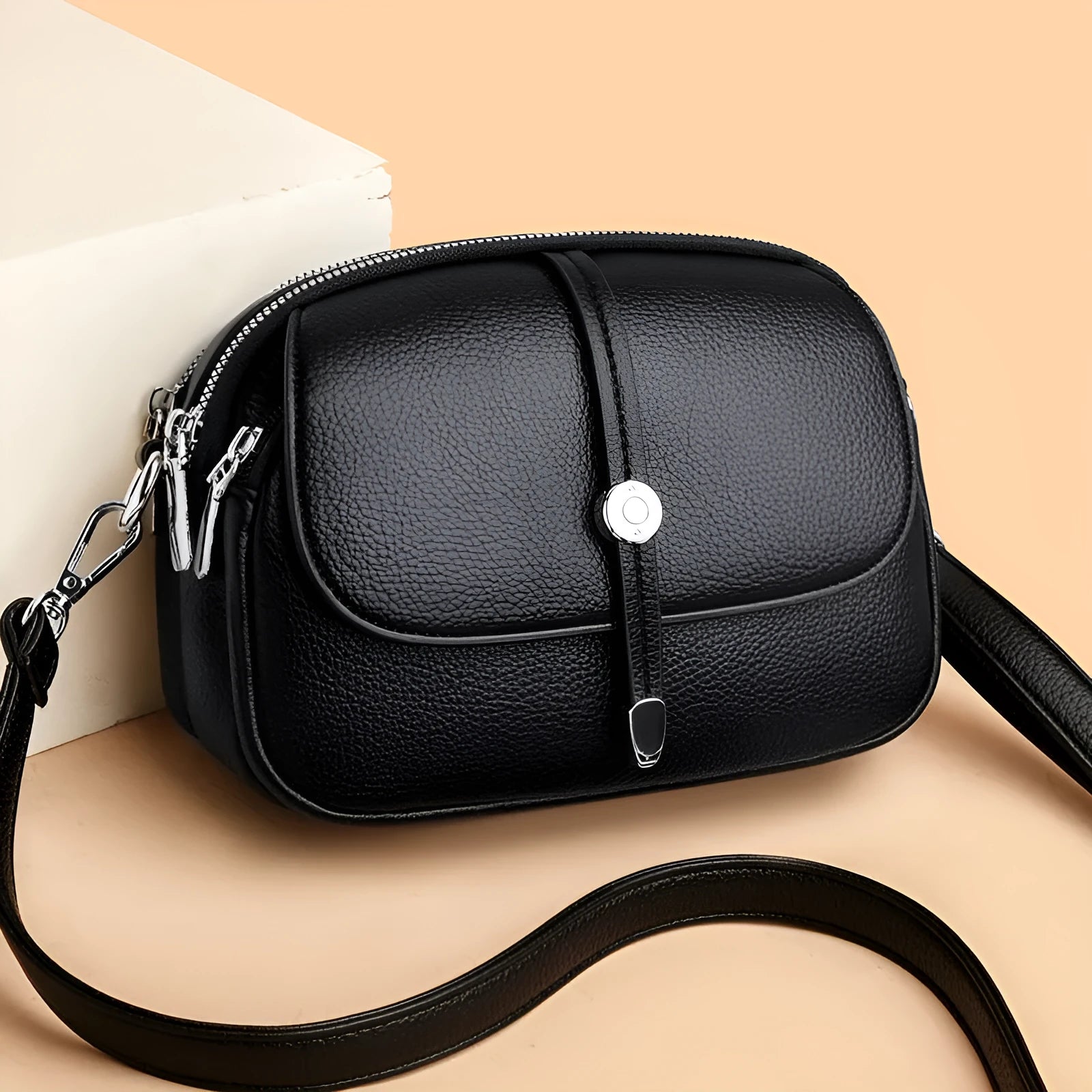 Women's soft PU leather crossbody shoulder bag oval shape in black khaki dark brown colours