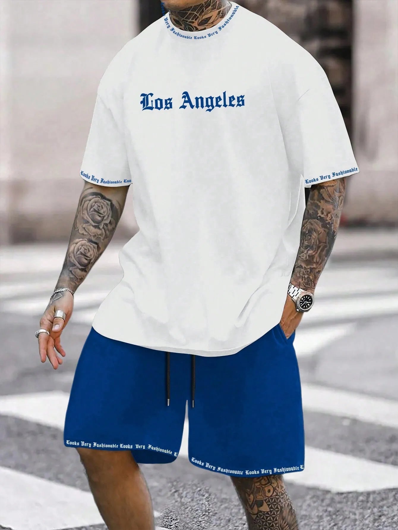 Man wearing a matching short-sleeved top and shorts from the quick-dry sports set.