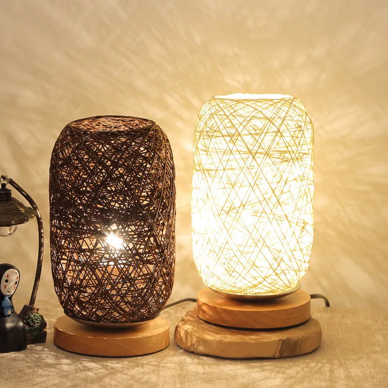 Brown hemp rope sphere desk lamp with wooden base on a desk