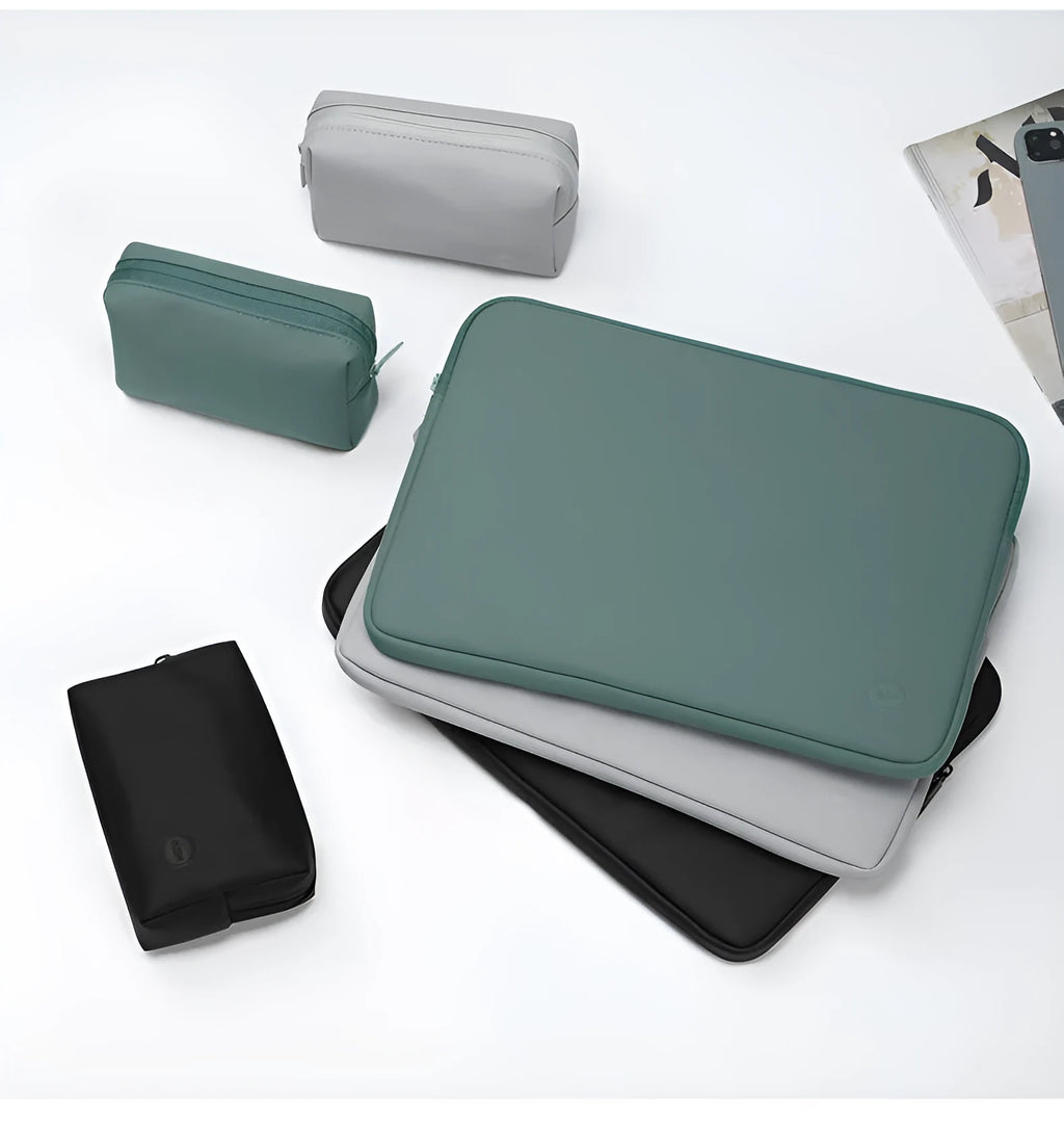 Laptop liner bag in mint green made from waterproof PU leather with shock-resistant padding, suitable for 13 to 17 inch laptops.