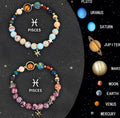 Set of twelve beaded bracelets with natural stone charms on a wooden surface, showing adjustable magnetic clasps.