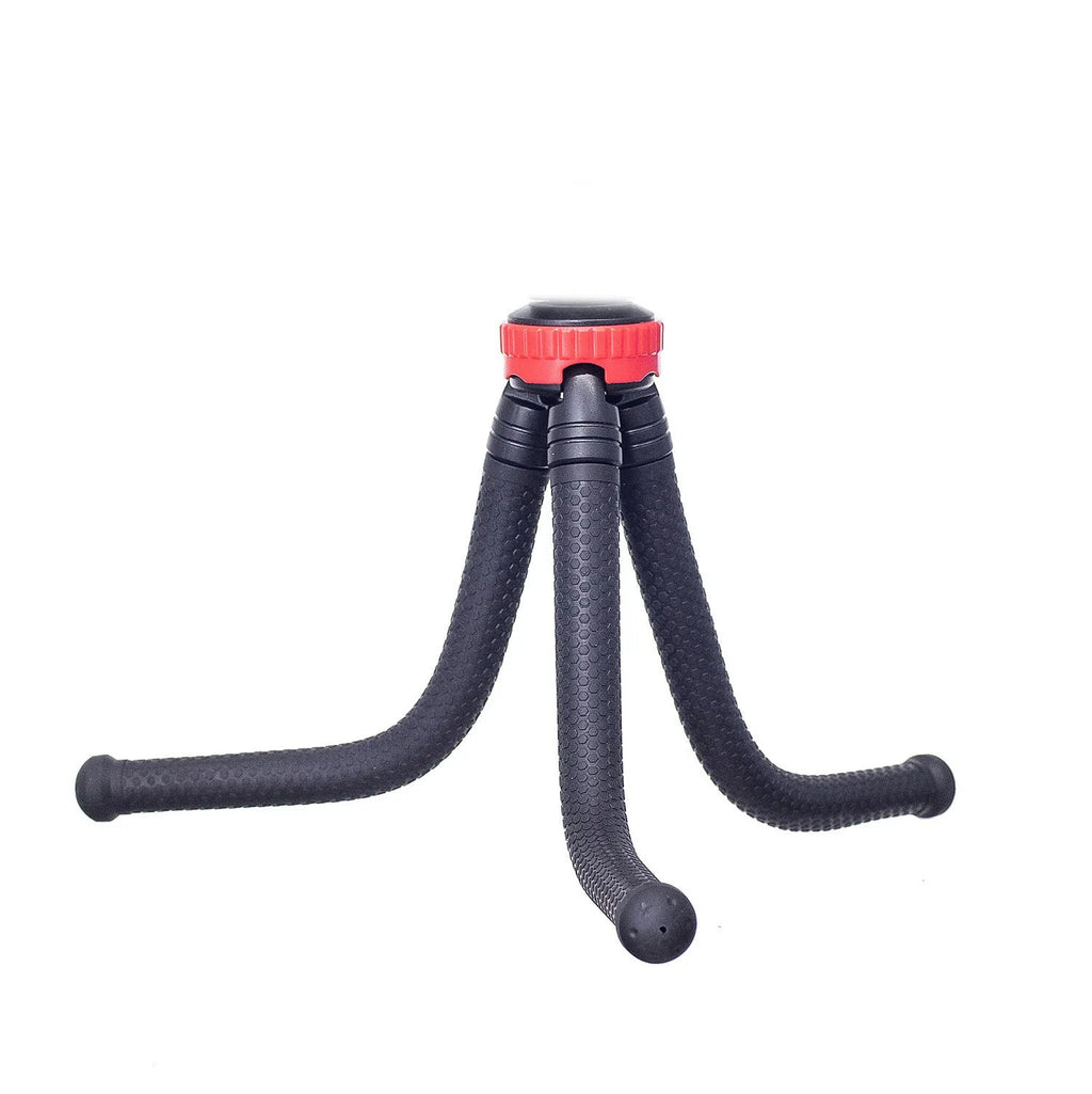 Black octopus tripod with flexible rubber legs wrapped around a pole, holding a mobile phone.