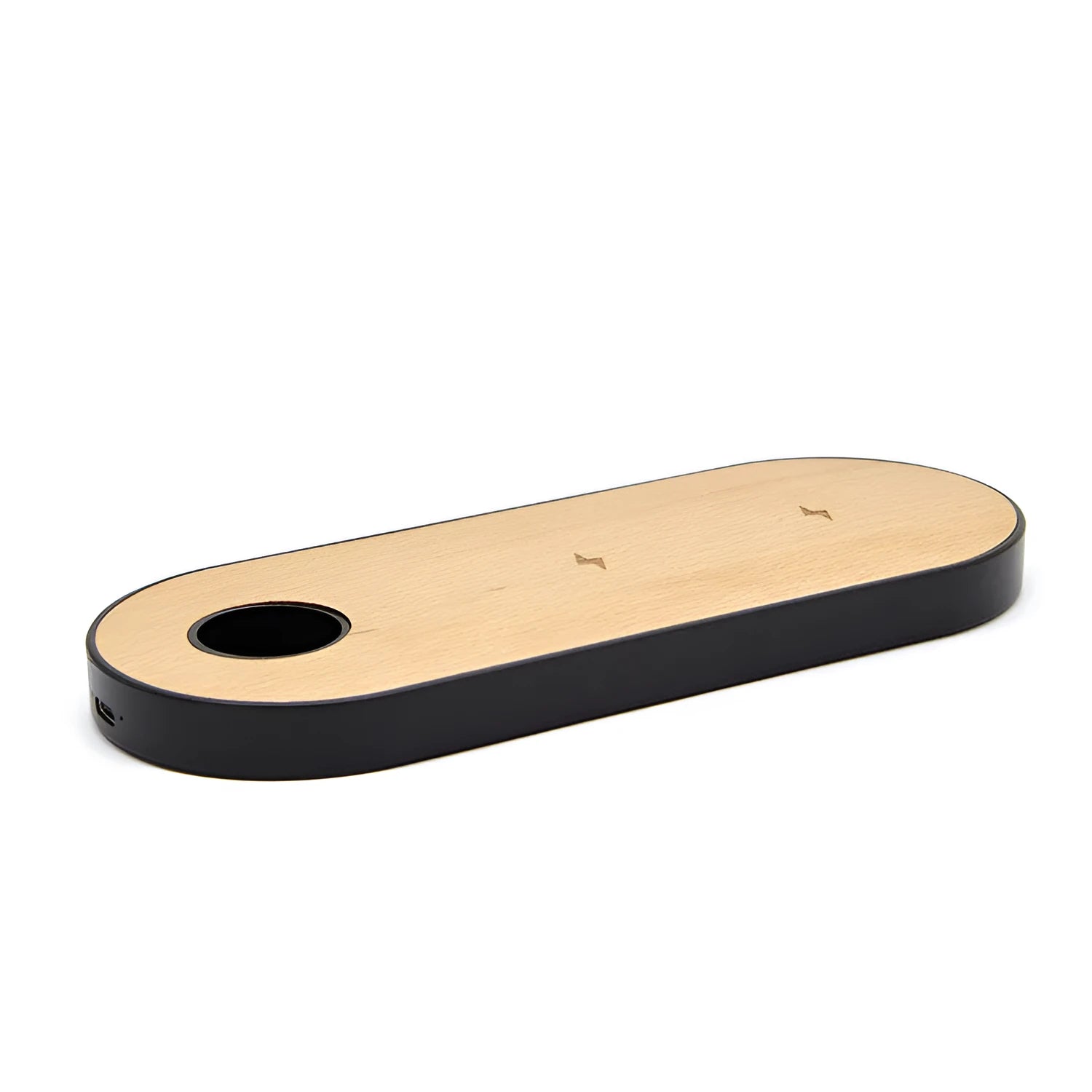 Natural bamboo and wood wireless charging pad on a desk