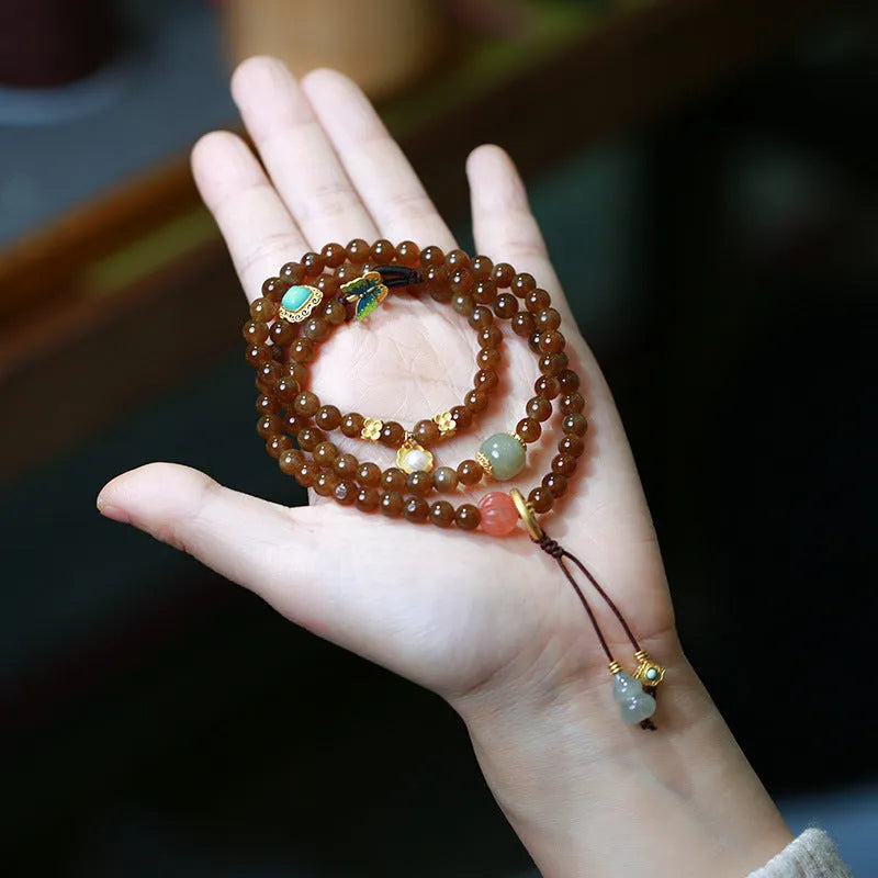 Brown jade Hetian jade three-ring bracelet with butterfly gourd pearl design and silver plated accessories