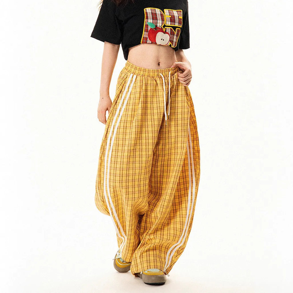 Loose straight drooping wide leg polyester trousers for women with side pockets, available in blue and yellow, sizes S to XXL