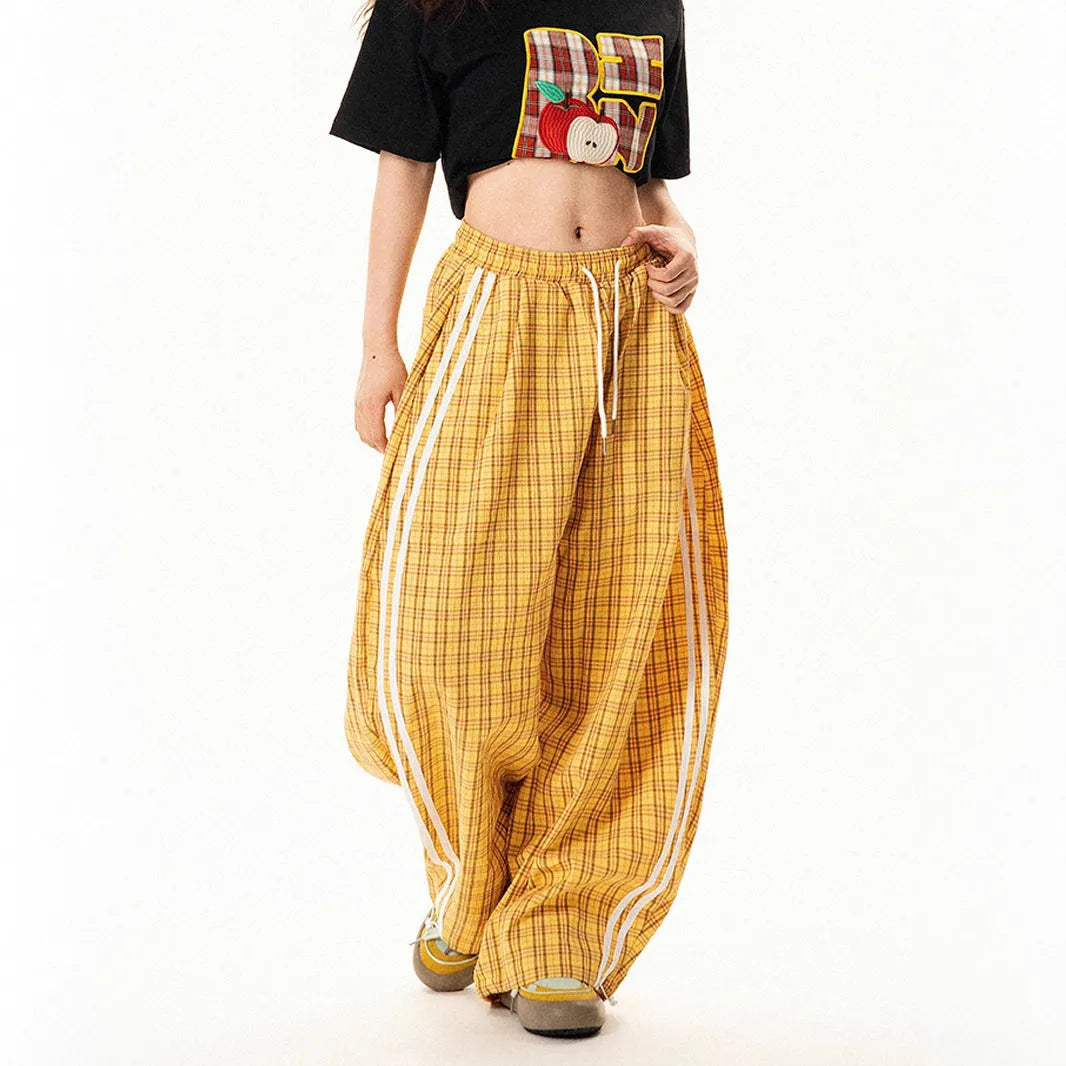 Loose straight drooping wide leg polyester trousers for women with side pockets, available in blue and yellow, sizes S to XXL