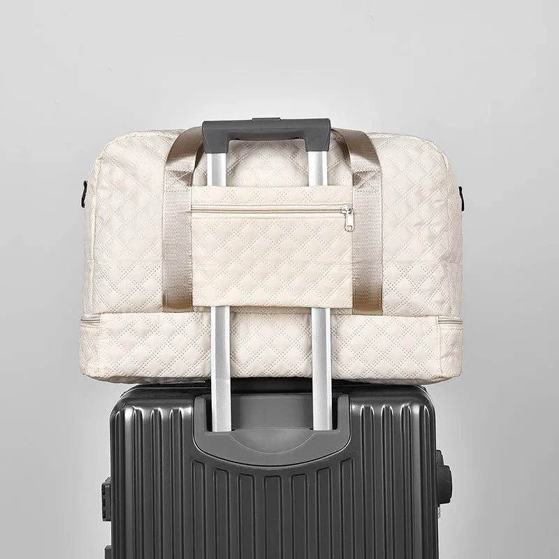 Oxford cloth portable travel bag in a solid colour with large capacity for buggies and leisure gear.