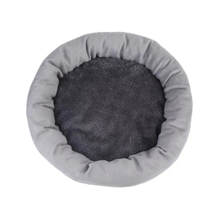 Round light grey dog bed with PP cotton filling and soft plush fabric