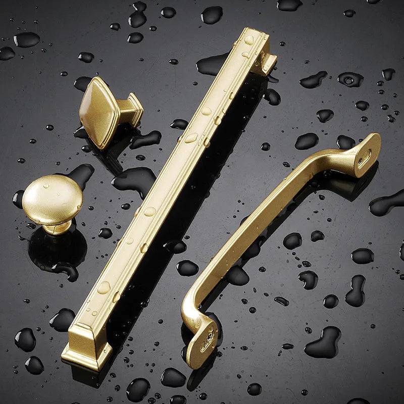Modern gold T-shaped aluminium alloy cabinet handle showing hole spacing options.