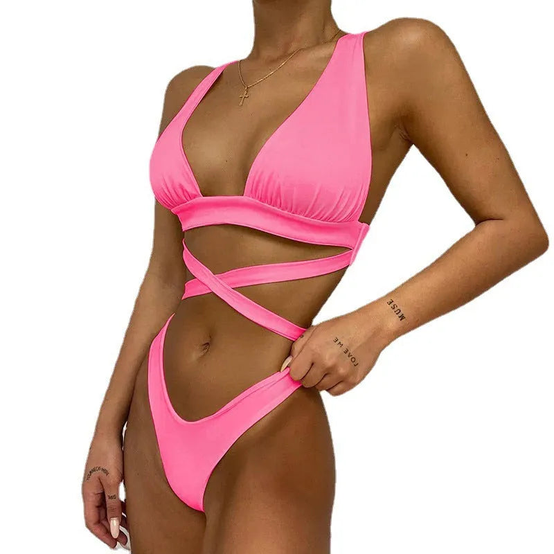 Women's solid color cross bikini swimsuit with chest pads in nylon, available in black orange pink purple yellow sizes S M L XL
