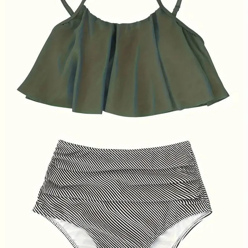 Green women's swimsuit with ruffles, high waist, and backless design on a mannequin.