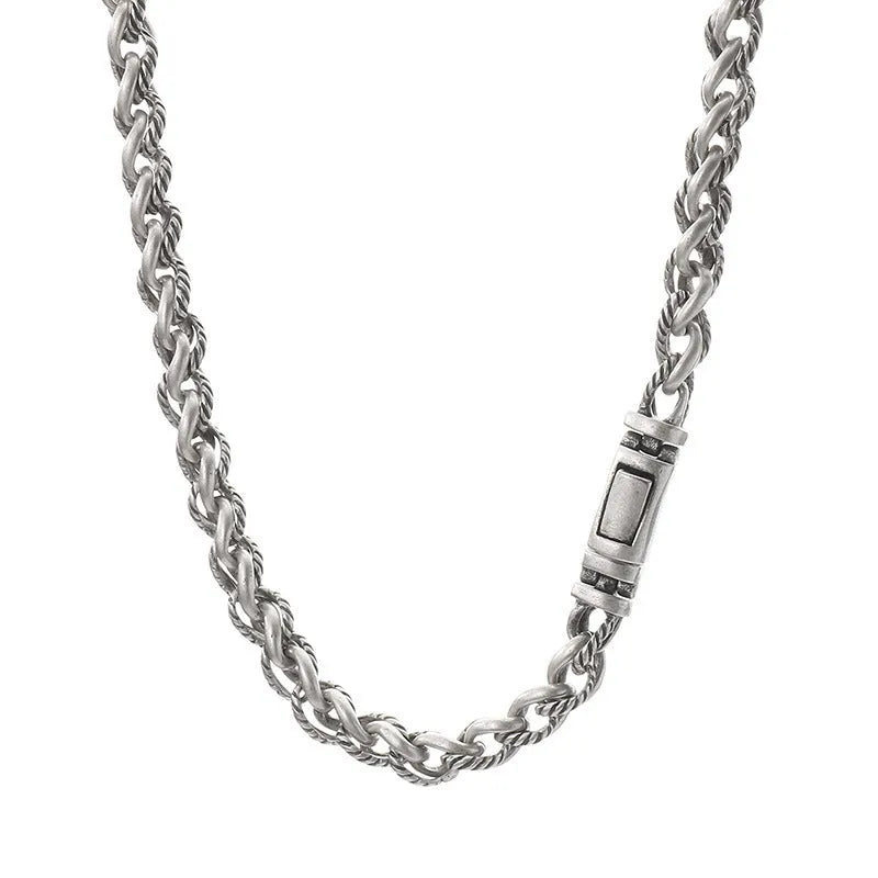 Men's keel twist titanium steel chain necklace in antique silver on a grey background