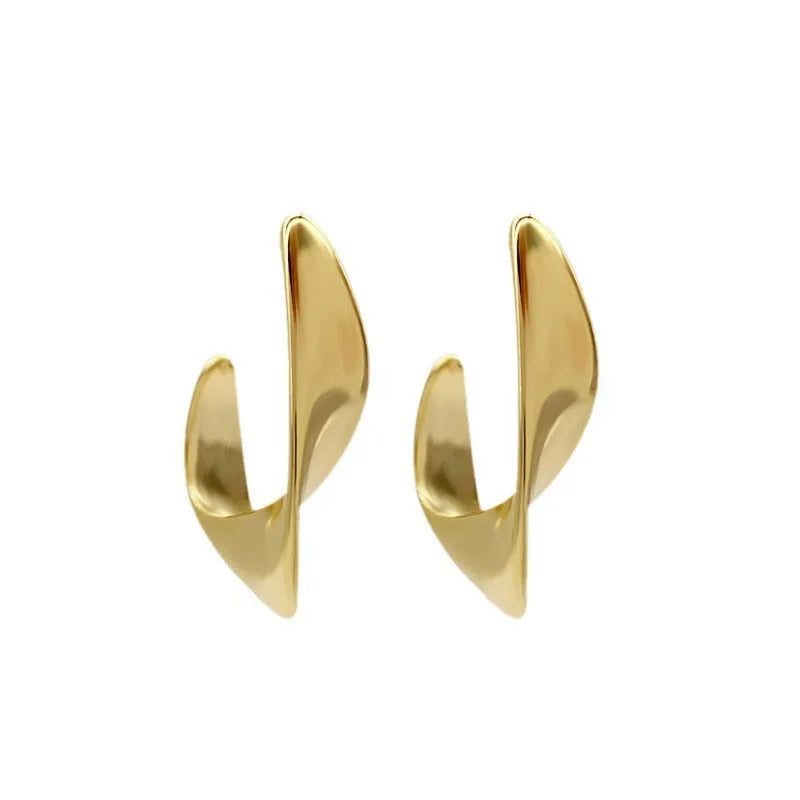 Twisted geometric metal earrings with circular design in gold or silver electroplated finish
