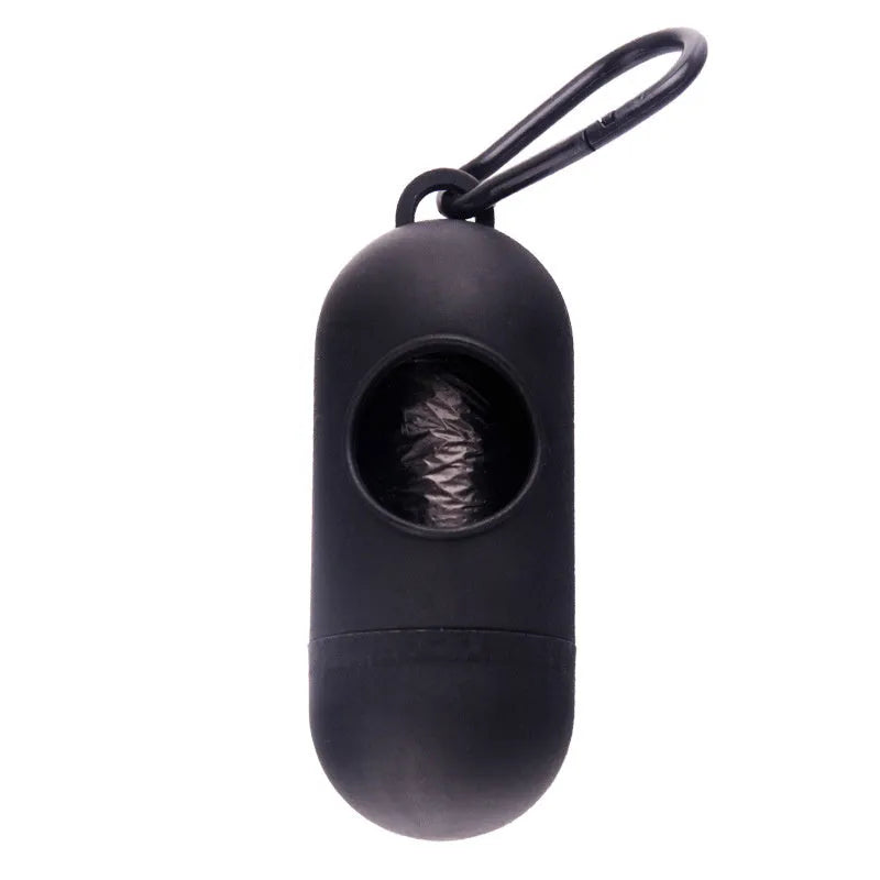 Black dog waste bag holder with Velcro strap and metal hook, showing bag dispenser slot.