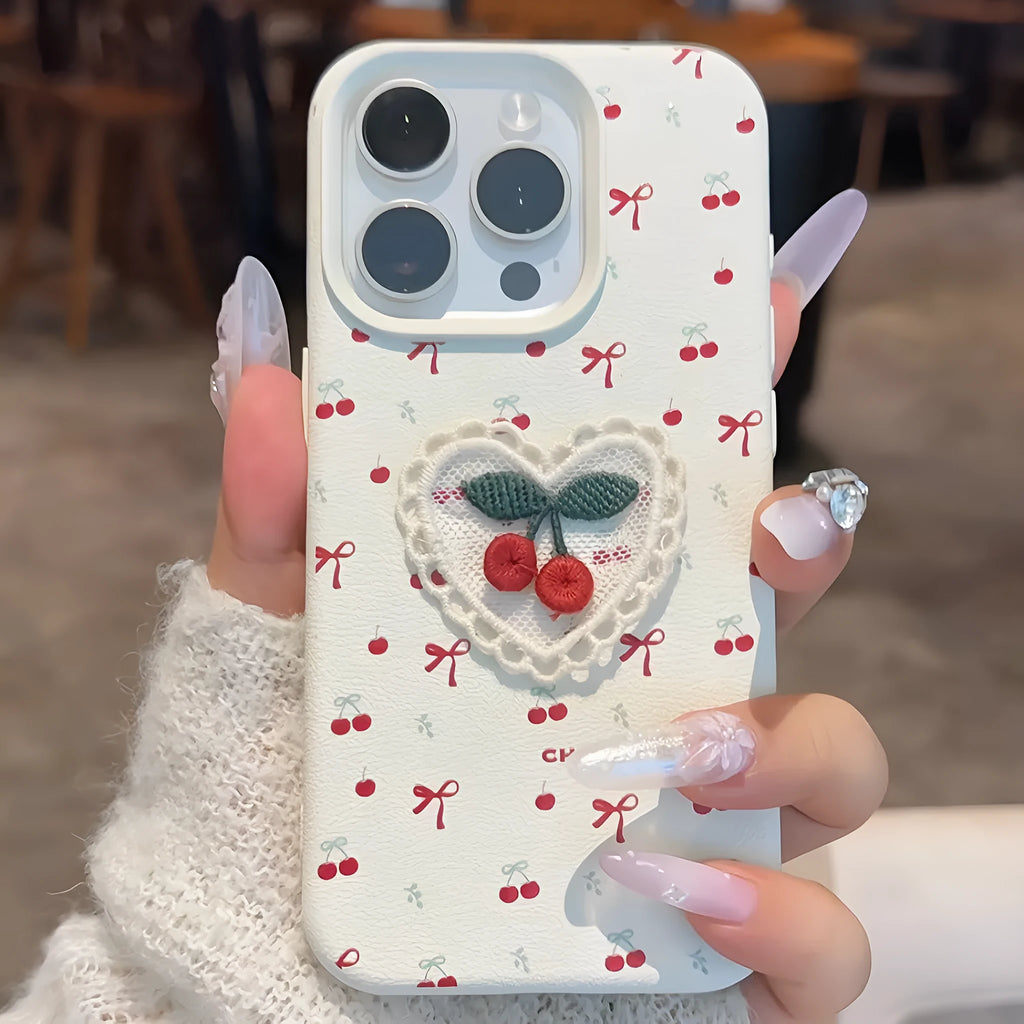 White lychee pattern iPhone case with three-dimensional embroidered cherry detail and anti-fall silicone cover