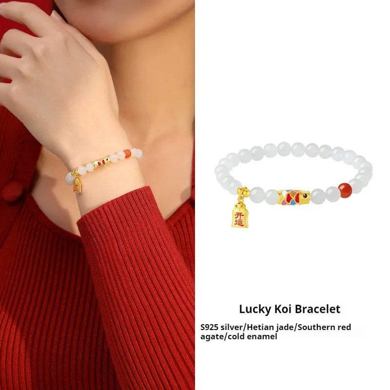 S925 sterling silver bracelet with a natural Hetian jade koi fish charm and cold enamel details.