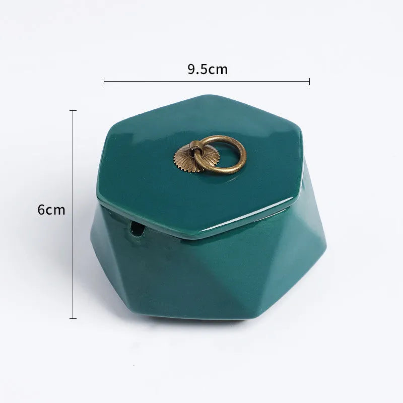Ceramic ashtray with lid, Nordic style, available in multiple colours, on a tabletop