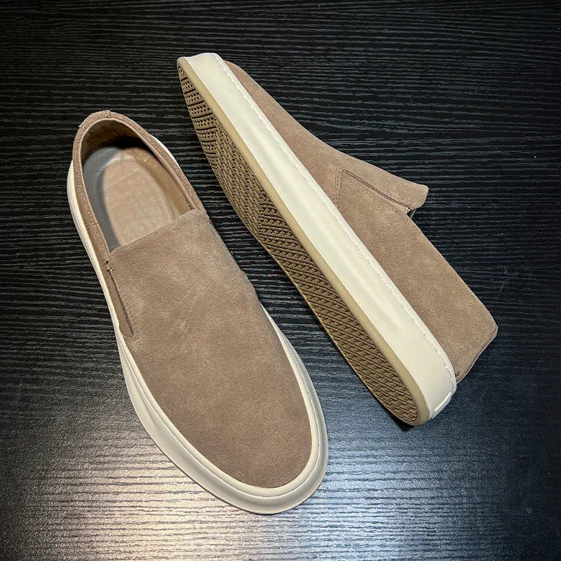 Gray men's casual slip-on shoes with round toe and mid heel on a white background