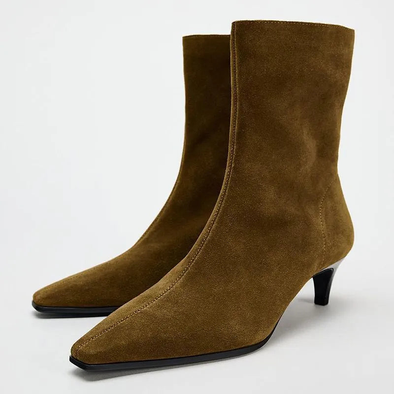 Brown square-toe mid-calf boots with a side zip and a stiletto kitten heel on a plain background.