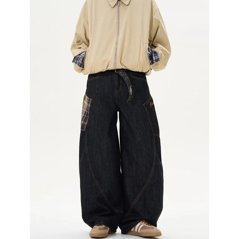 Loose straight-leg cotton trousers in a red plaid pattern, showing mid waist and casual fit.