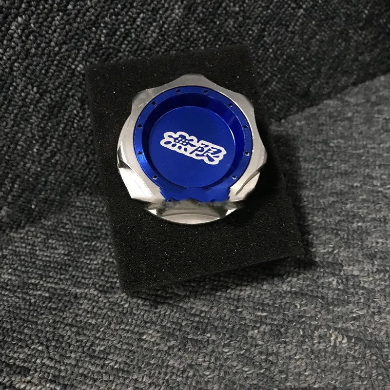 Aluminium alloy oil filter cap for Honda vehicles in assorted colours on a dark background.