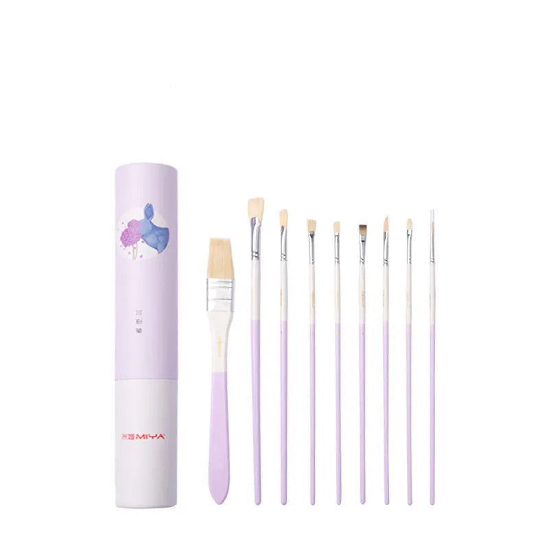 Acrylic gouache painting brush set with fan brushes, liner, and corner tools in animal designs on a table