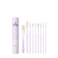 Acrylic gouache painting brush set with fan brushes, liner, and corner tools in animal designs on a table
