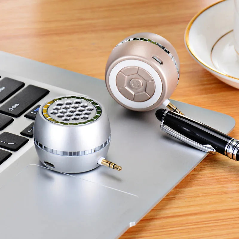 Universal single-channel portable speaker amplifier in black, local gold, and rose gold finishes.