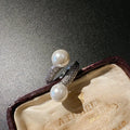 Twist plate geometric ring with white shell pearl and inlaid zircon accents