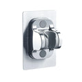 Black portable shower head with 5-speed dial, connected to a silver hose and mounted on a white punch base.