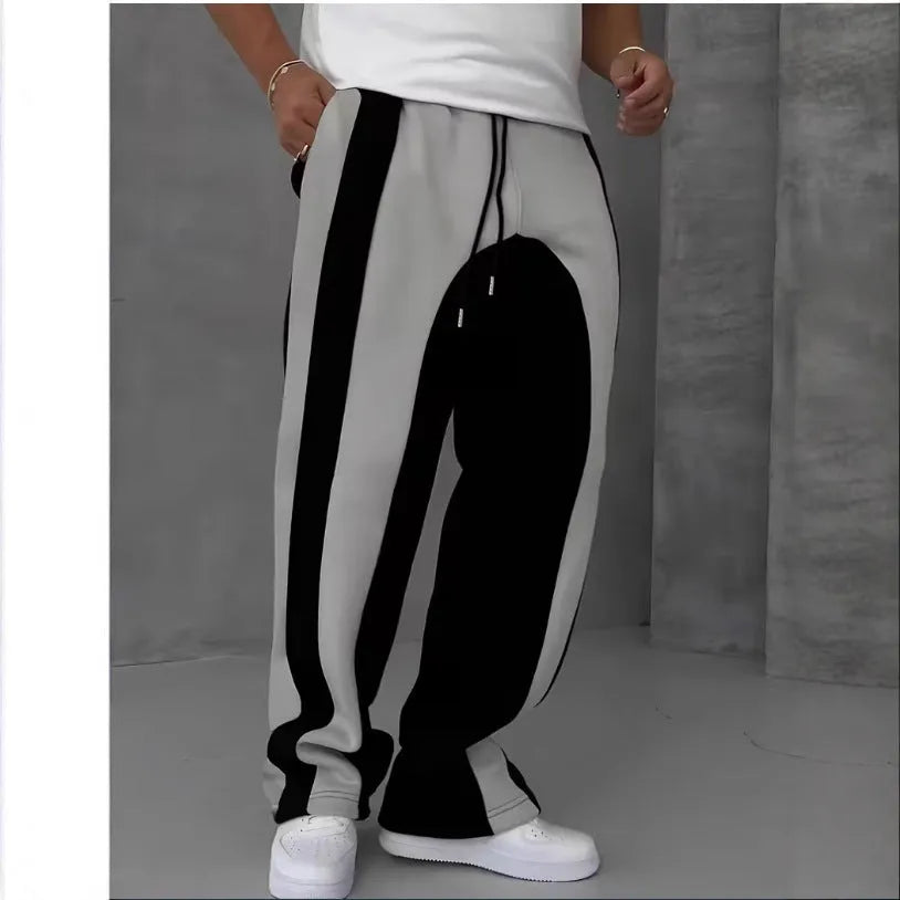 Straight sports pants in loose fit polyester with digital print, black on the back option