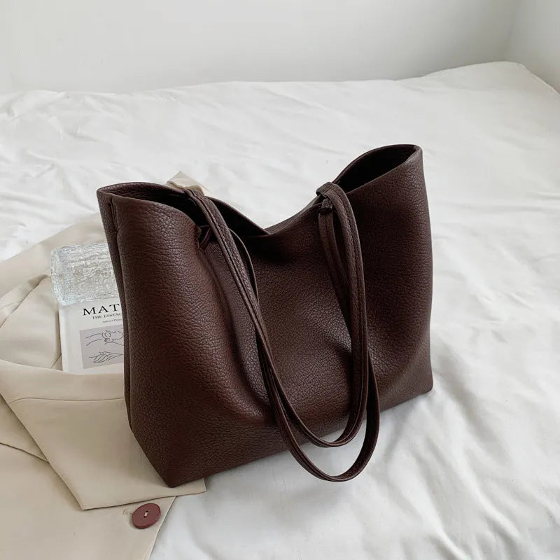 Women's retro shoulder bag in PU leather with double straps, soft handle, and 3D outer pocket, shown in five colours.
